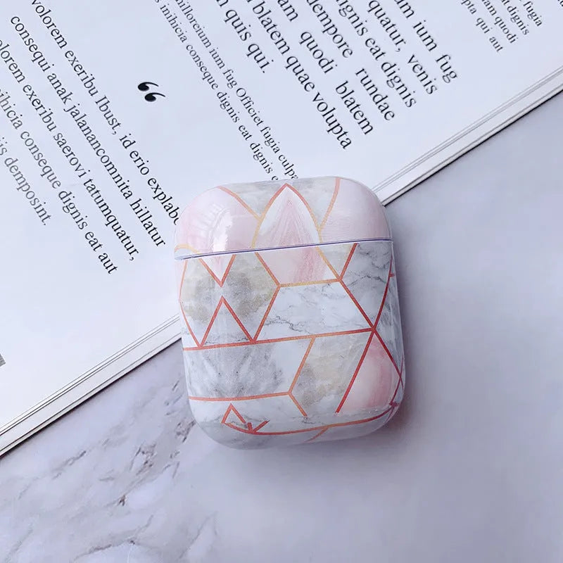 White marble pattern hard protective case for AirPods 1 and 2 wireless headphones charging box.