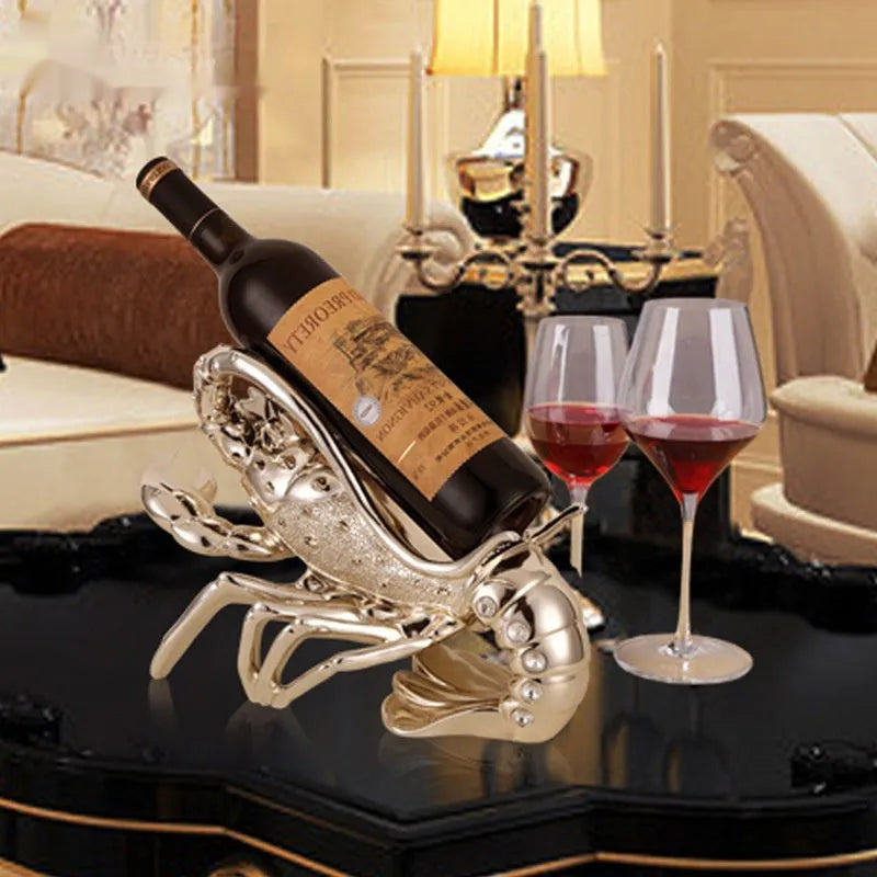 Lobster-shaped decorative wine rack ornament in rose gold or silver holding wine bottle