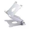 Folding aluminium alloy lifting laptop stand in black on a wooden desk showing adjustable height