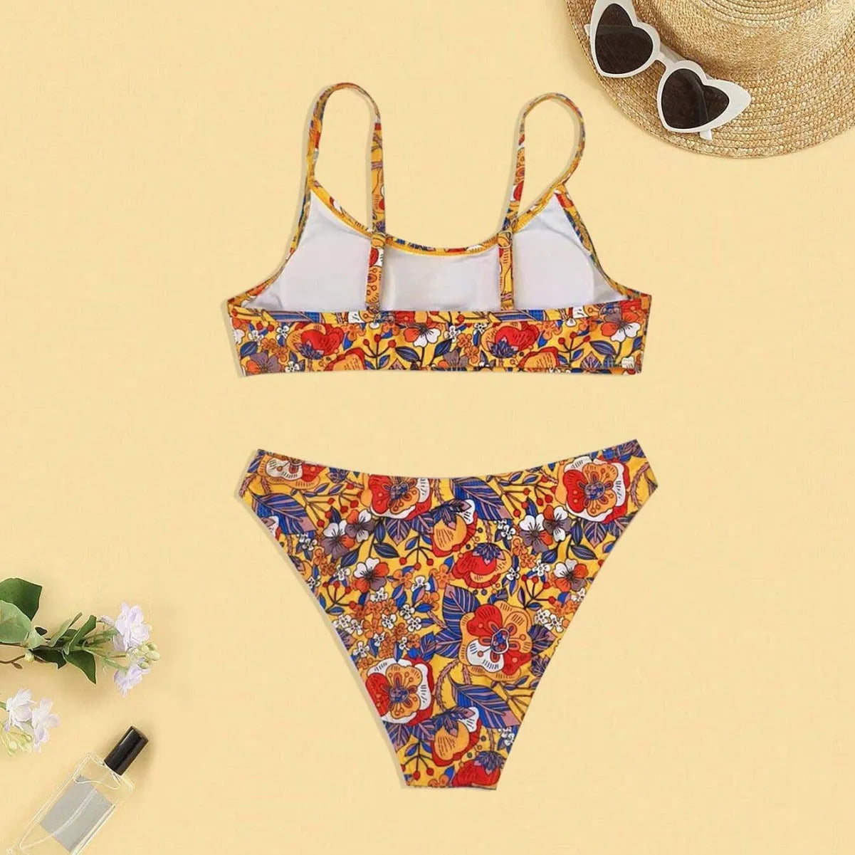 Plus size women's floral print bikini with adjustable straps, two-piece swimsuit set in colourful patterns