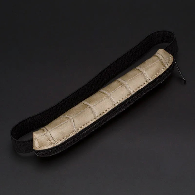 Long slim PU leather pencil case in beige grey, black, and crocodile print colours.