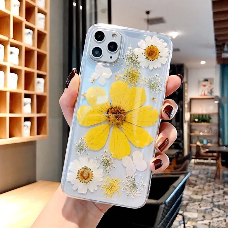 Floral TPU phone case with large pink and yellow flower designs for iPhone