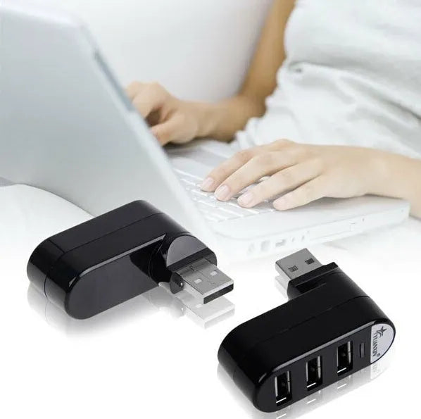 Black and white USB hub with four USB 2.0 ports for computer expansion