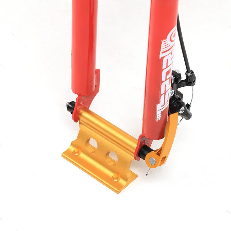 Silver metal quick release fixing clip for bicycle front fork on a white background