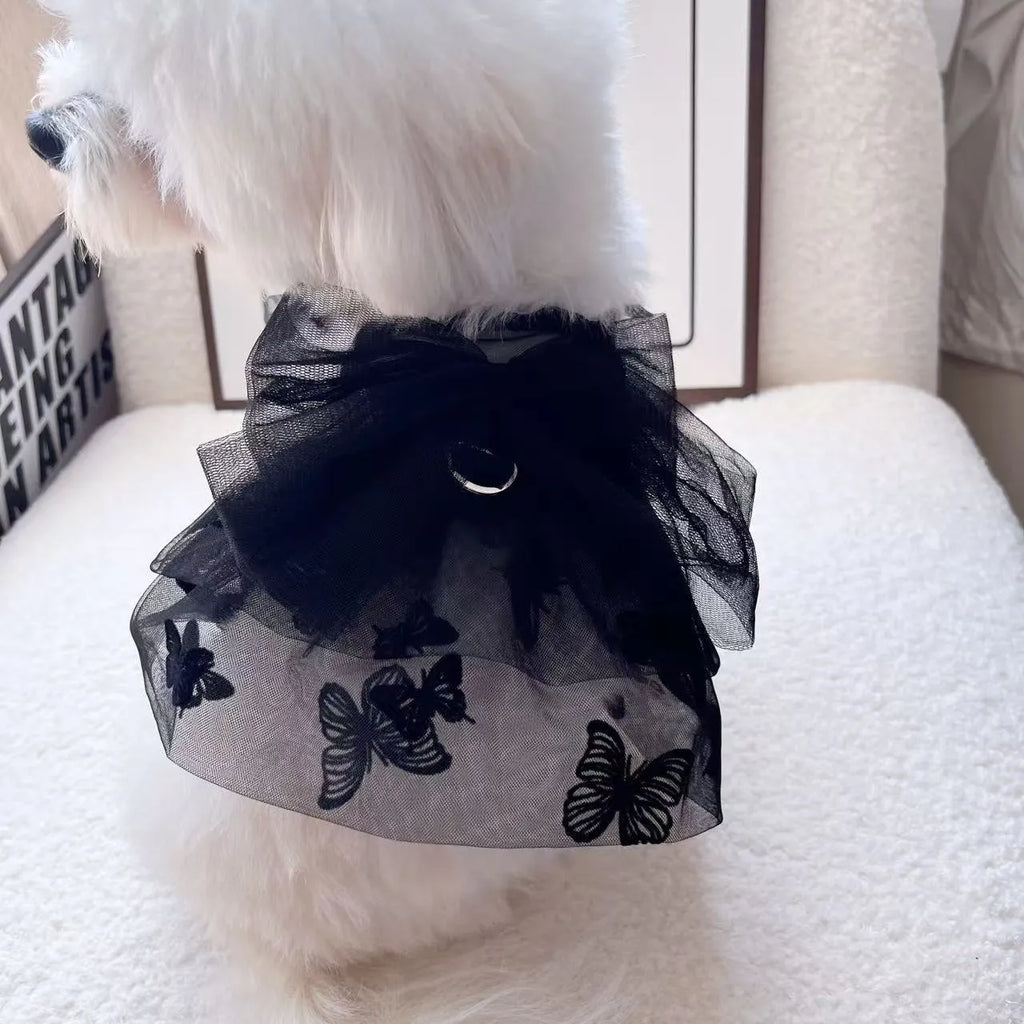 Black tulle princess skirt costume for a small dog on a mannequin.