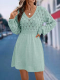 V-neck long sleeve beach dress with a 3D pattern and high waist in apricot colour.