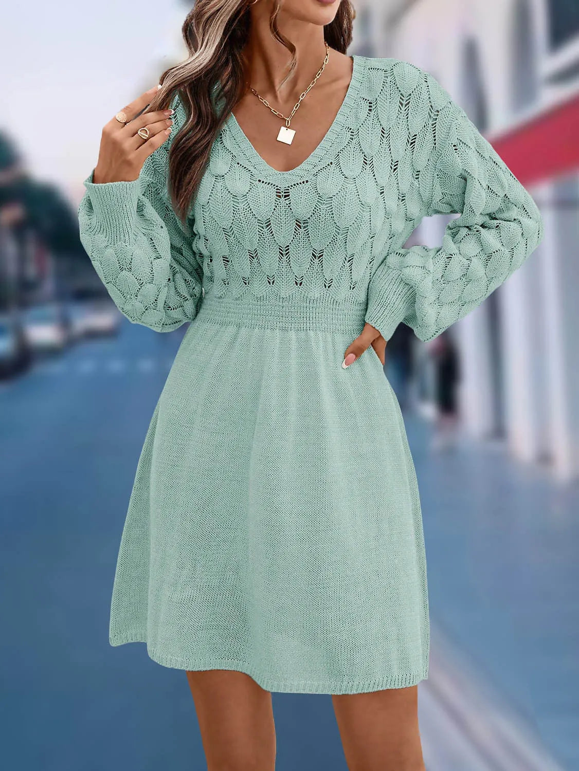 V-neck long sleeve beach dress with a 3D pattern and high waist in apricot colour.