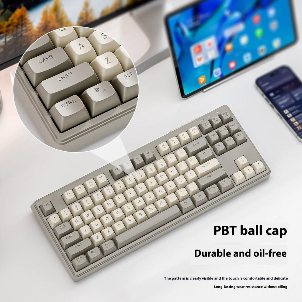 Free Wolf M87 wireless Bluetooth dual mode mechanical feeling keyboard in blueberry colour on desk