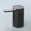 Black and white portable bucket table water pump with LCD touch screen in folded position.
