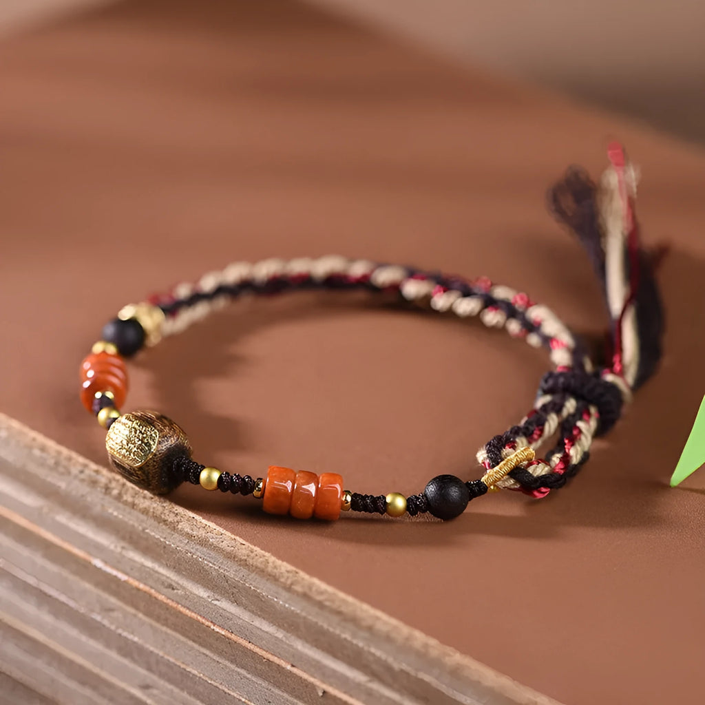 Hand woven ethnic bracelet with lapis lazuli colour and rope design on flexible wire