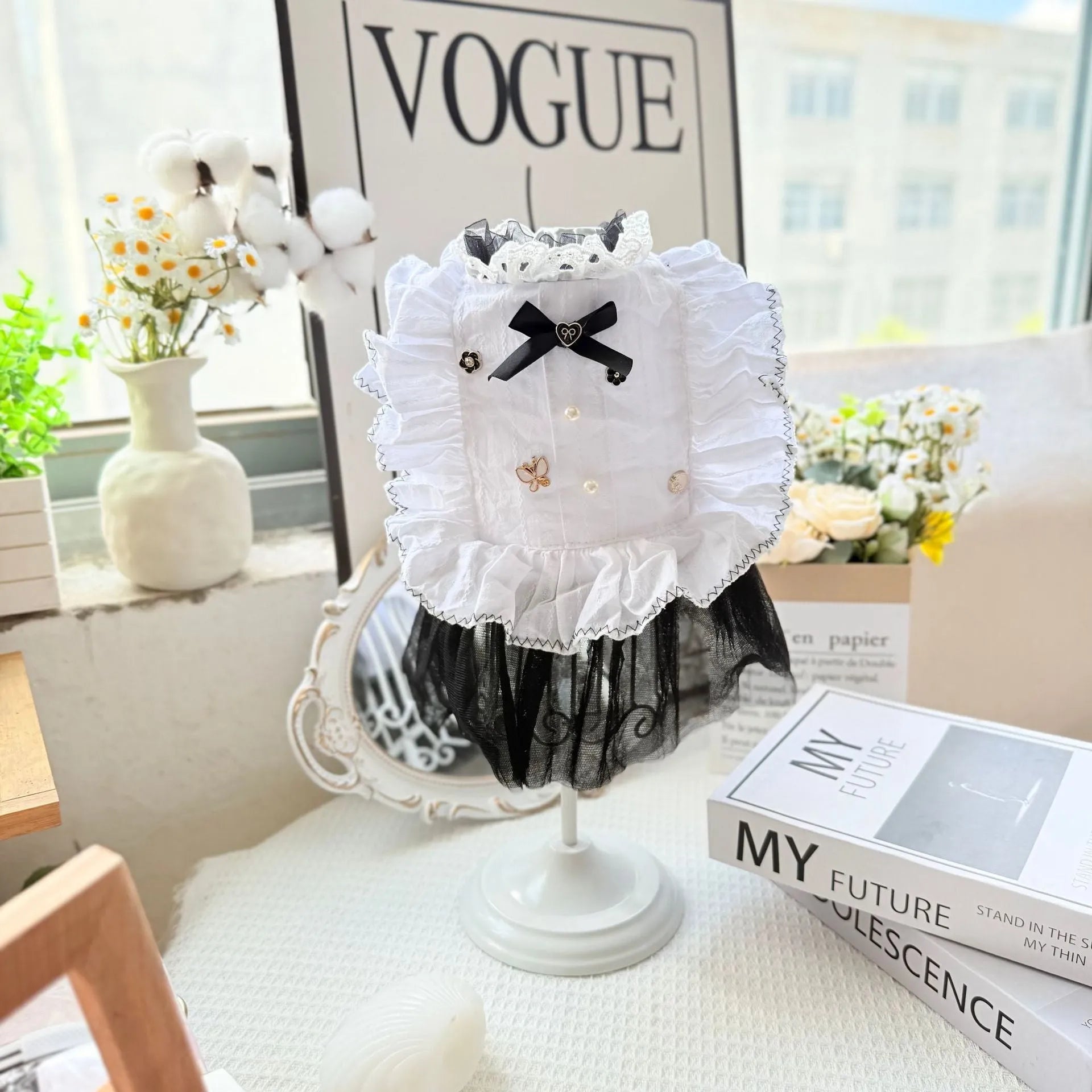 White polyester princess-style dog dress with a gauze skirt for small dogs.