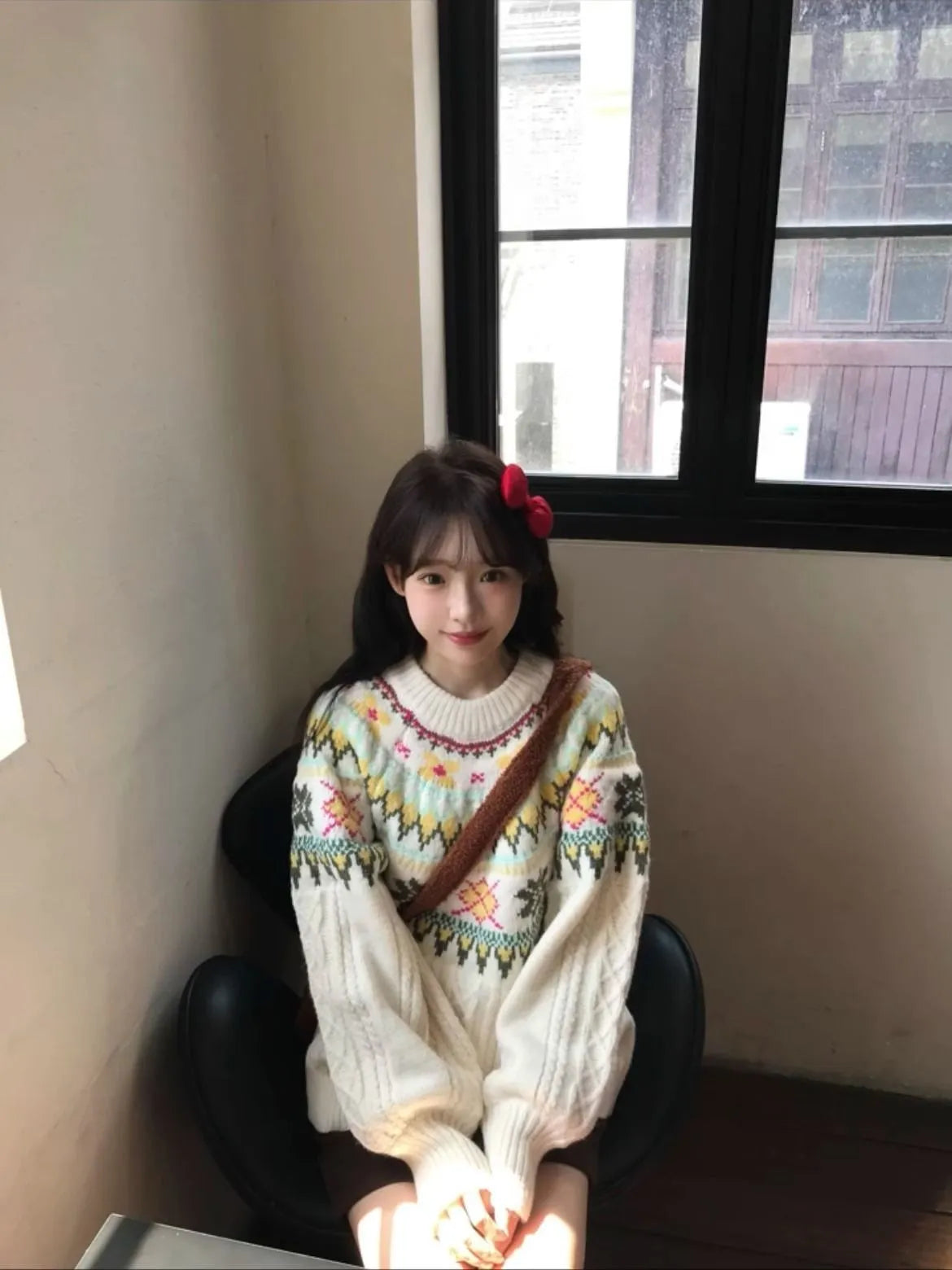 Milky white women's pullover sweater with lantern sleeves and a loose fit.