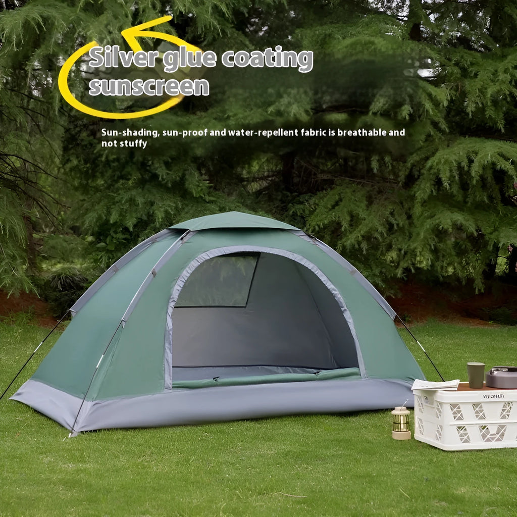 Single-person manual camping tent in army green, set up outdoors with fibre-glass poles.