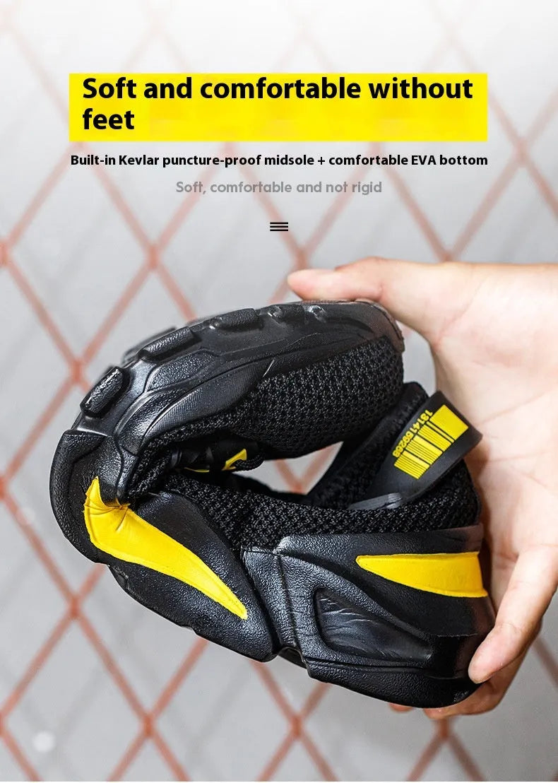 Men's black Flyknit low-top work shoes with steel toe cap on grey background