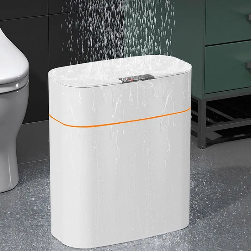 White induction smart trash can with automatic lid on a kitchen floor.