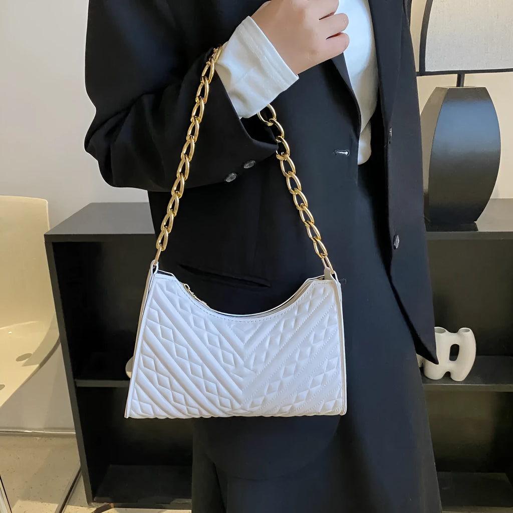 Brown PU leather pleated chain baguette shoulder bag showing adjustable strap and square shape