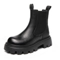 Women's brown brushed cowhide Martin boots with high horseshoe heel, round toe, and thick rubber sole