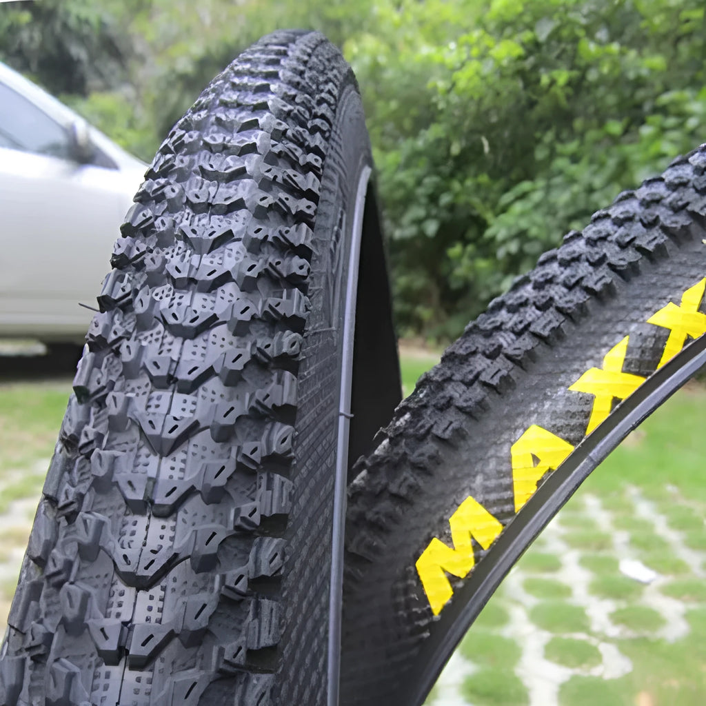 Mountain bike ultralight puncture-proof tyre shown in multiple sizes for 26, 27.5, and 29-inch wheels.