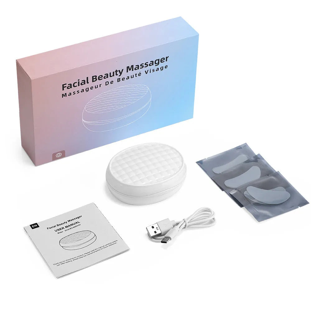 White handheld red light EMS facial beauty device for eye and face massage