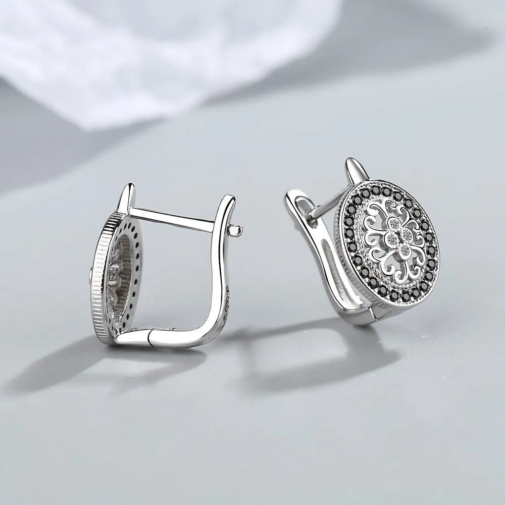 Diamond-encrusted round small ear clip earrings for women copper plated platinum finish geometric shape