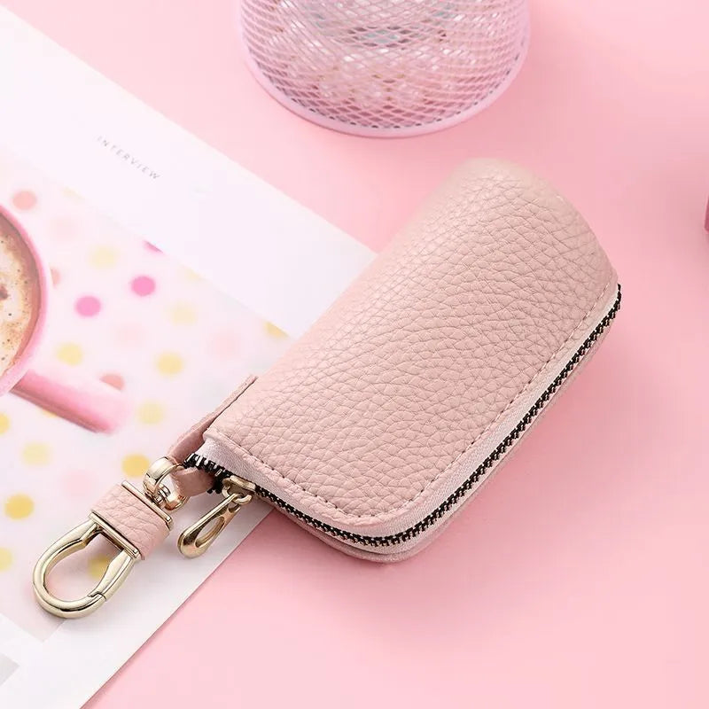 PU leather zipper key ring case in black, grey, and pink colours showing waterproof key organiser