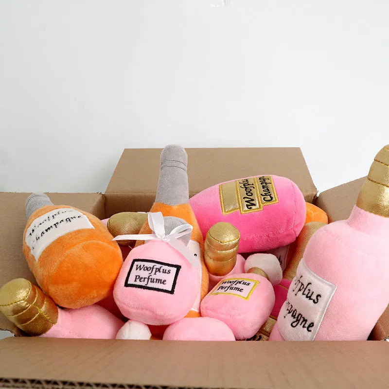Soft plush pet toy in the shape of a wine bottle, shown in various colours.