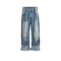 Men's straight leg baggy jeans in a washed blue denim colour with a zip fly.