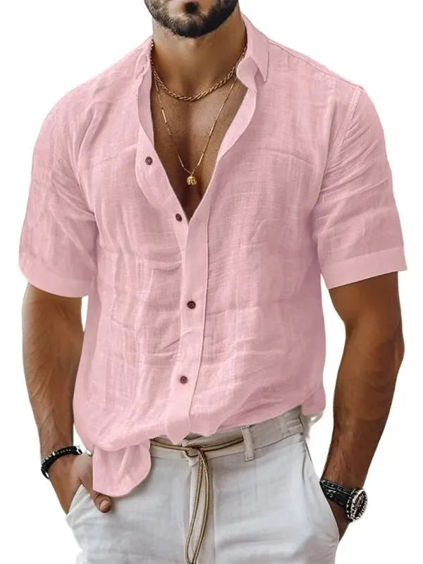 Men's solid colour short sleeve lapel shirt in light green shown on a hanger