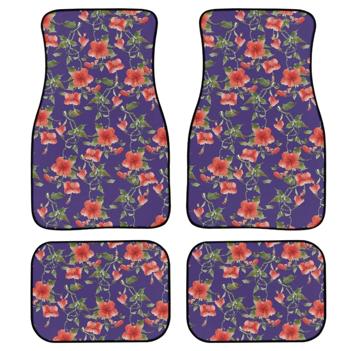 Four-piece set of black printed rubber car floor mats with textured surface.