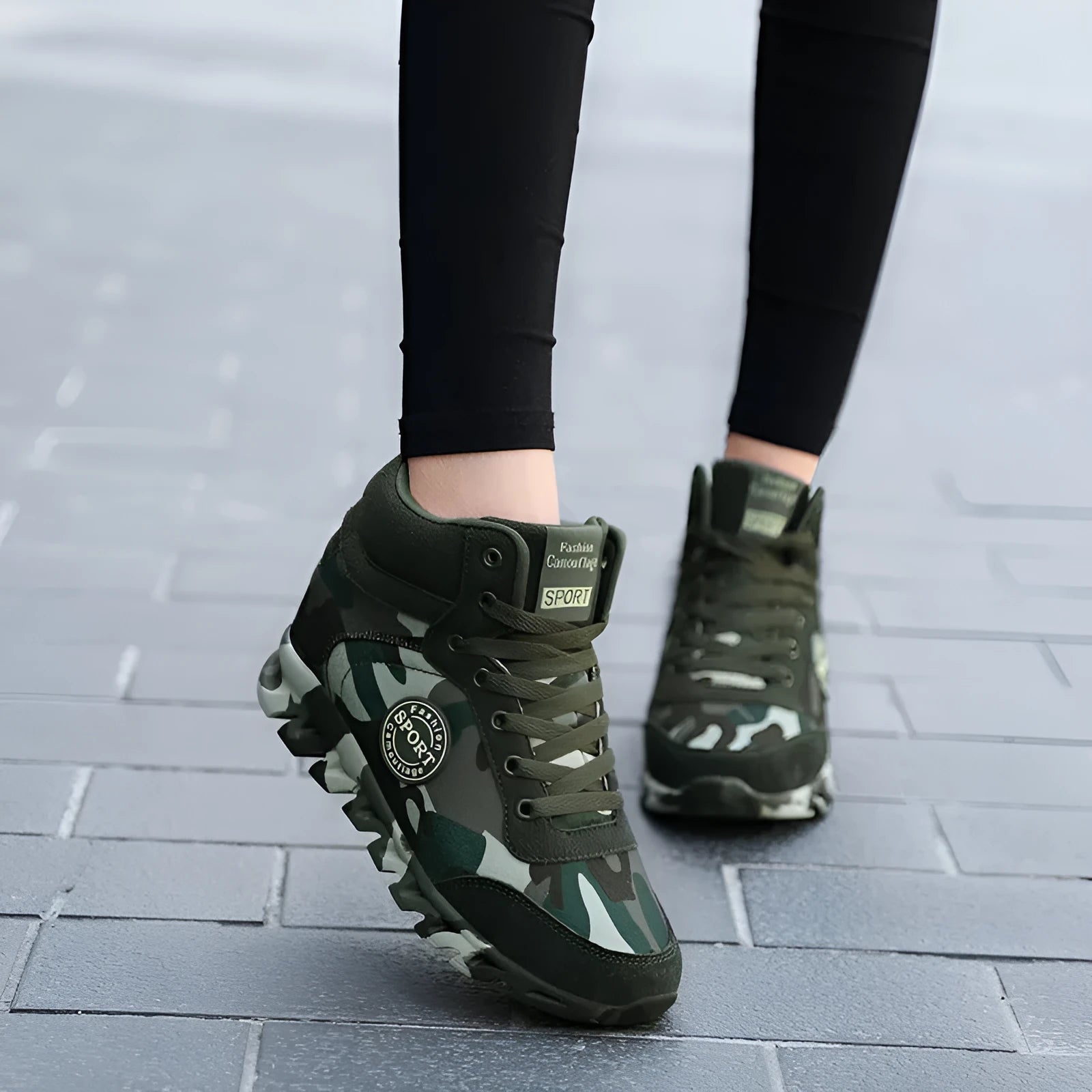 Women's green camouflage canvas sneakers with rubber soles showing slip-on casual style