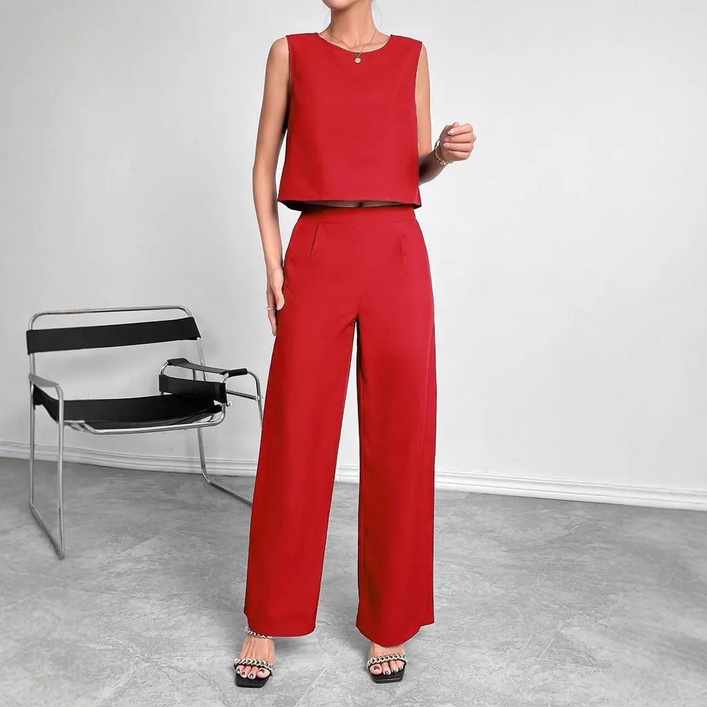 Women's red sleeveless top and wide leg trousers two-piece set laid flat