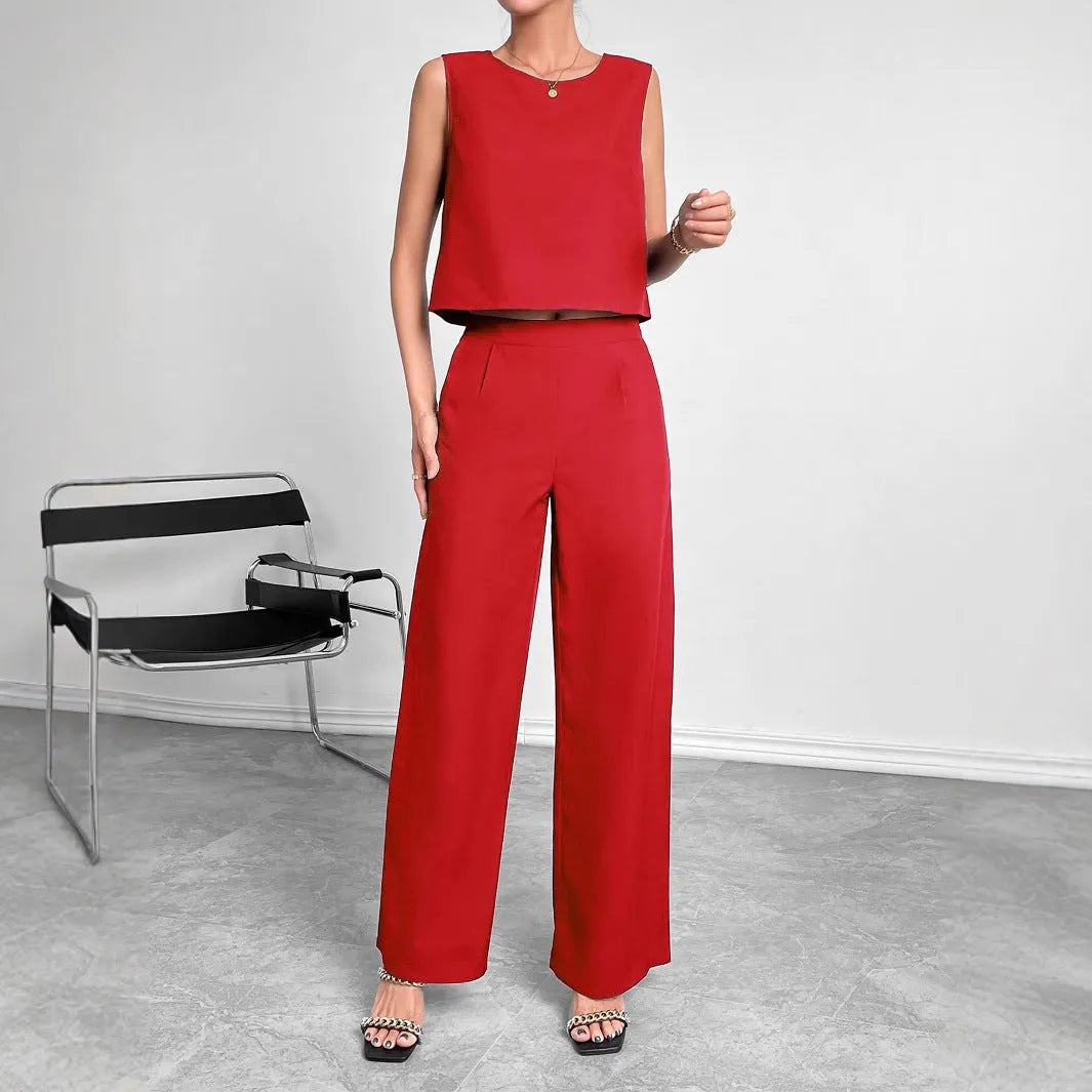 Women's red sleeveless top and wide leg trousers two-piece set laid flat
