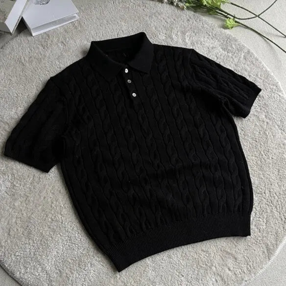 Short sleeve twisted knit summer T-shirt in light gray on a hanger