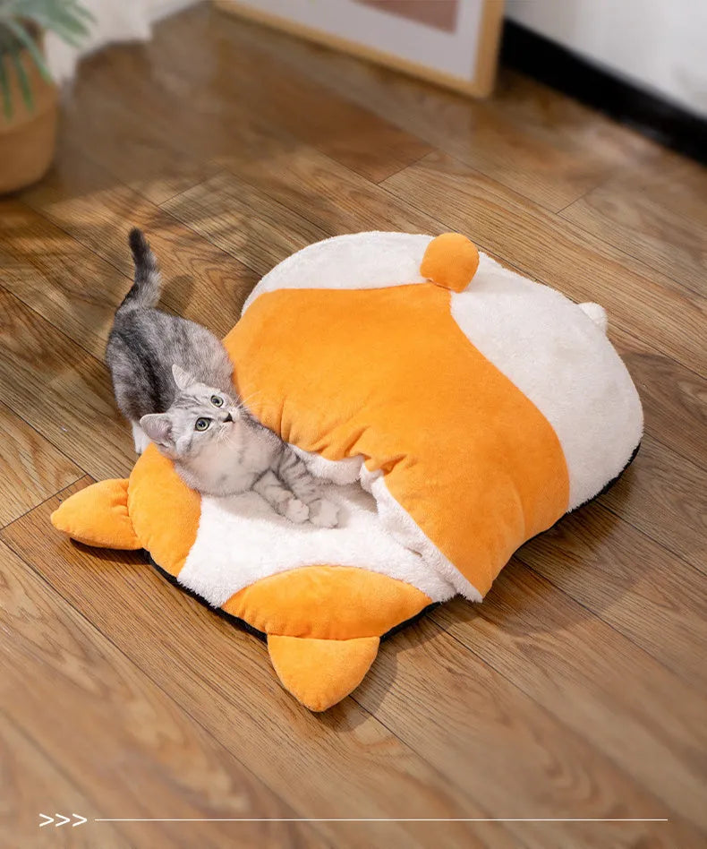 Orange semi-closed cat sleeping bag bed measuring 65cm by 53cm.