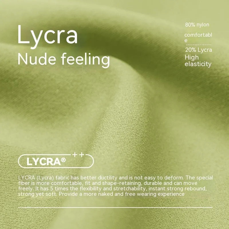 Woman wearing leaf green high waist Lycra yoga shorts for fitness exercise.