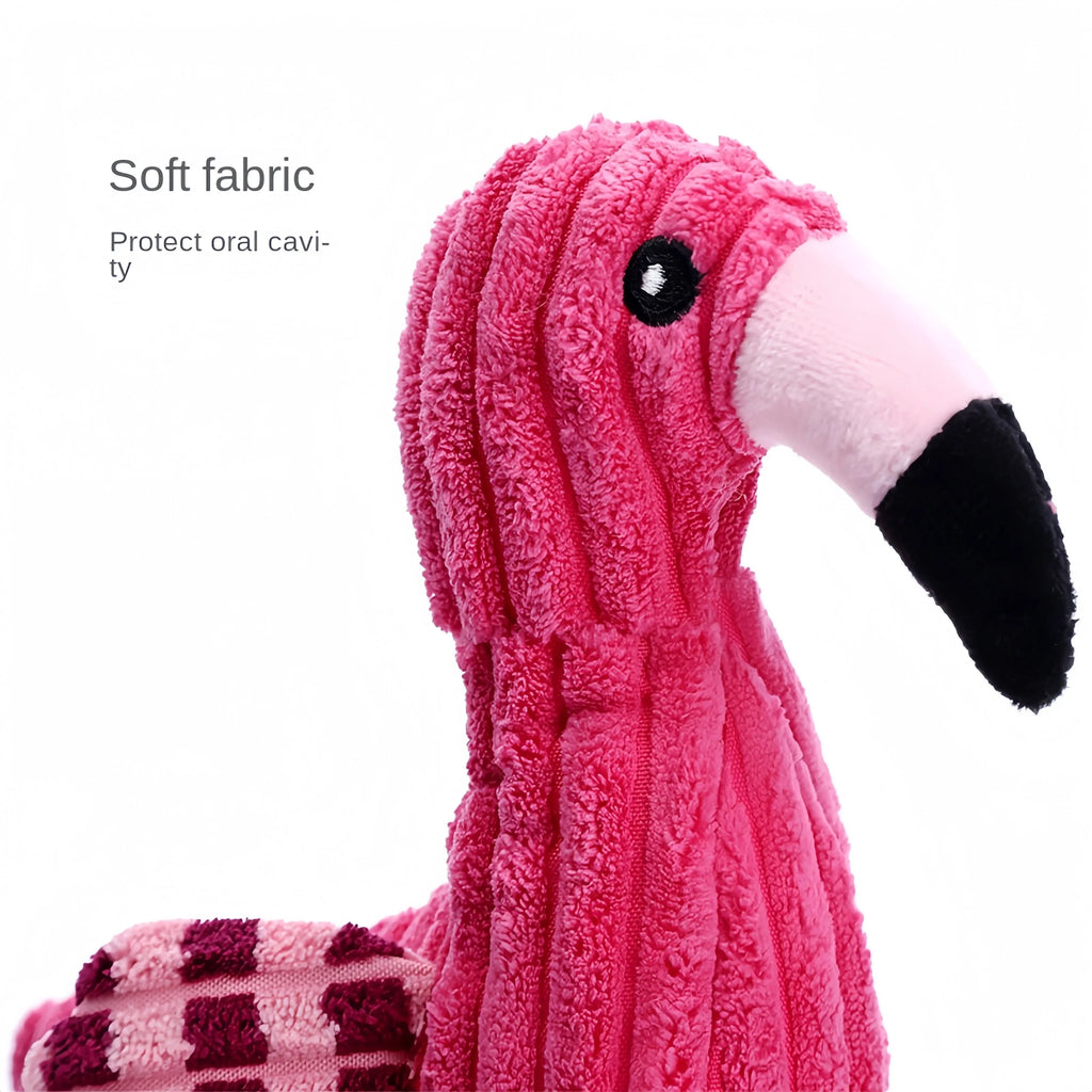 Pink corduroy animal-shaped squeaky dog toy with reinforced stitching