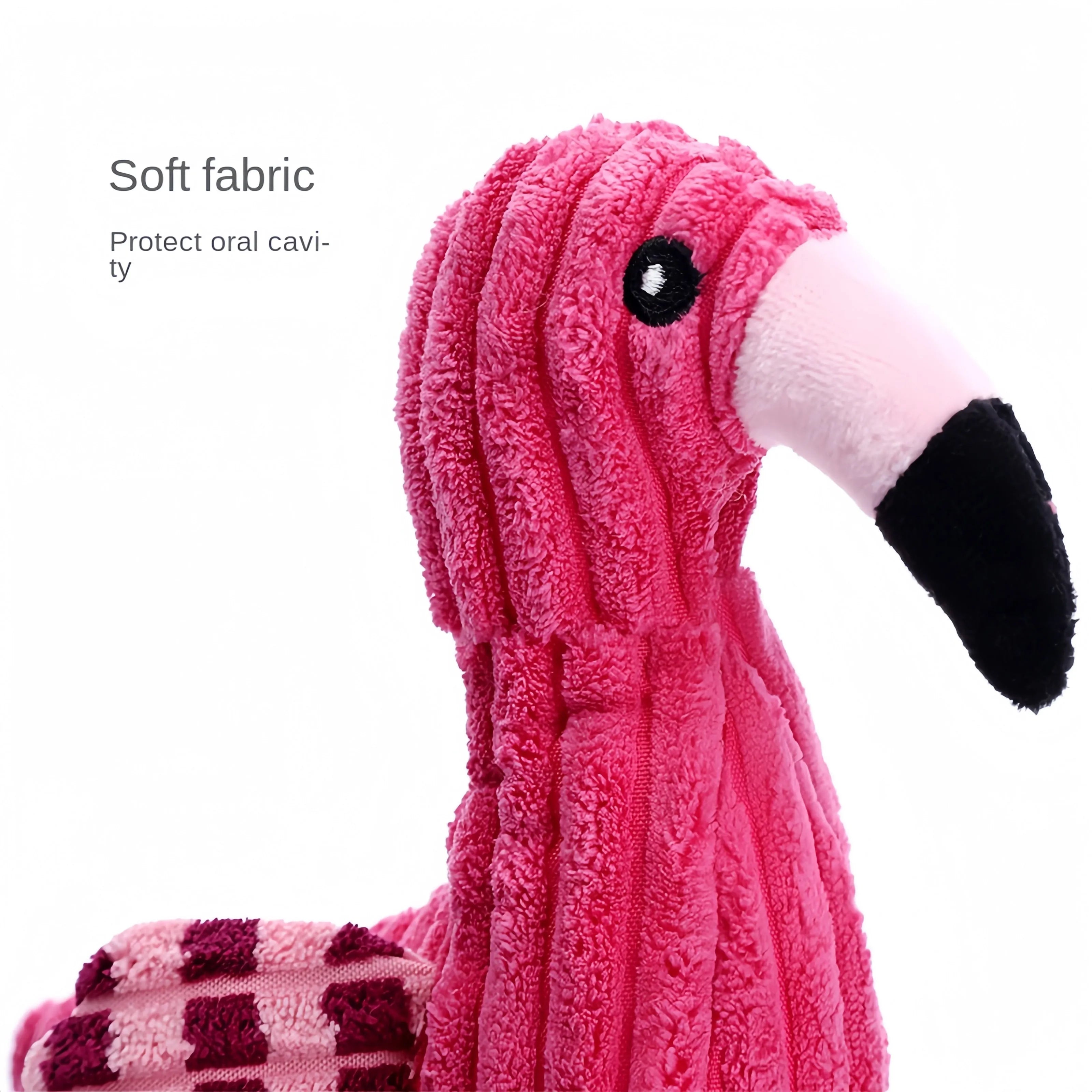Pink corduroy animal-shaped squeaky dog toy with reinforced stitching