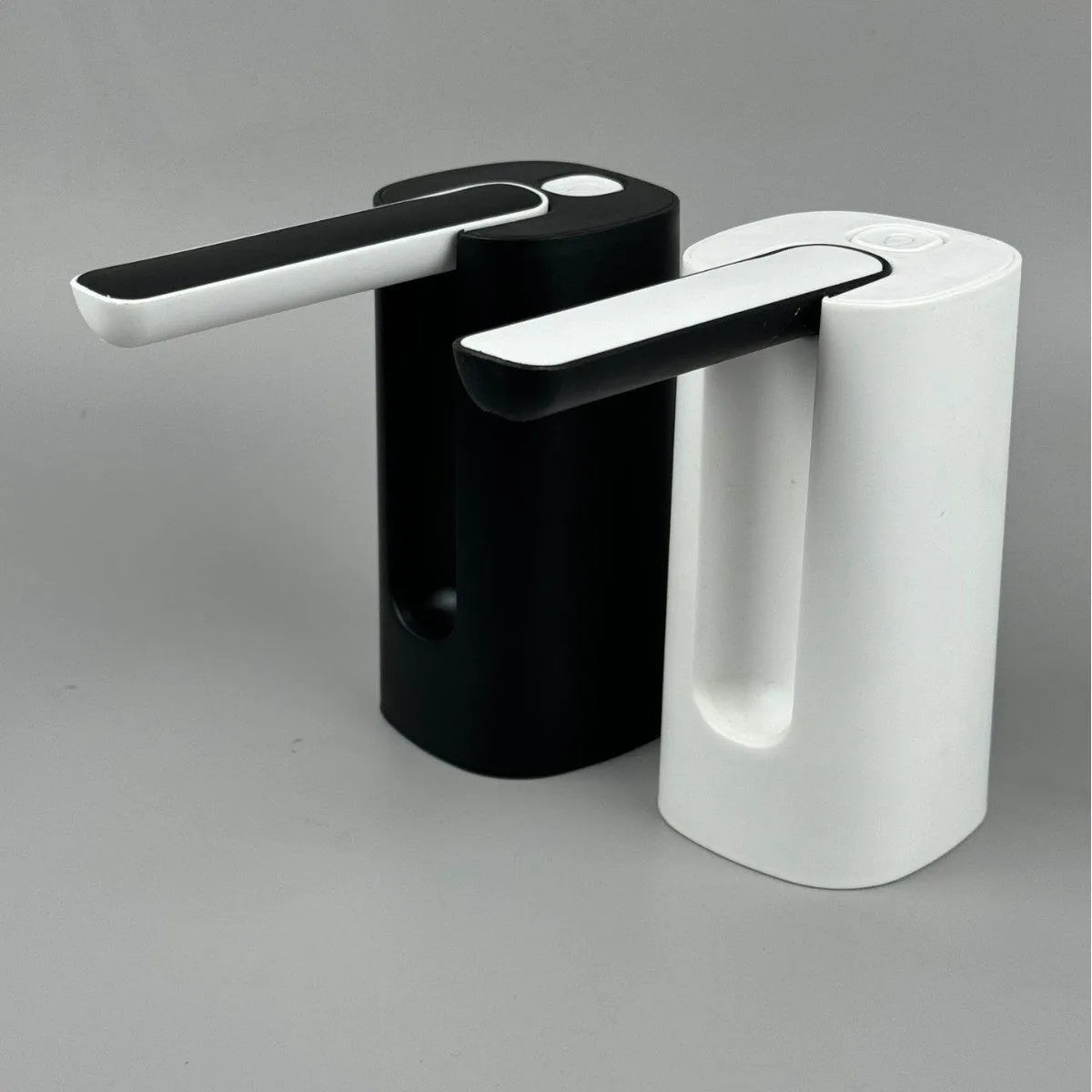 Black and white portable bucket table water pump with LCD touch screen in folded position.