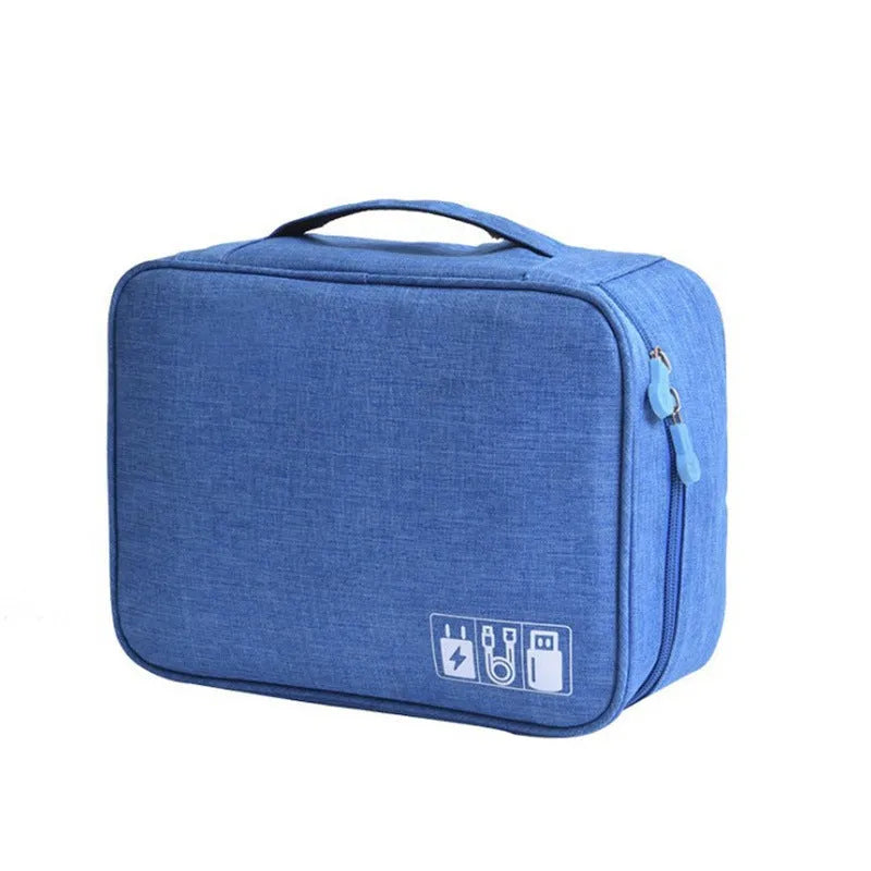 Blue cationic fabric digital accessories sorting bag for organising cables and chargers.