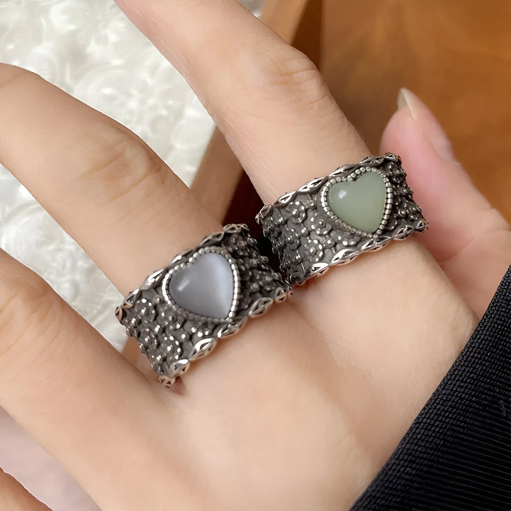 Retro style adjustable silver ring with a large heart shape and moon design in white or green colour.