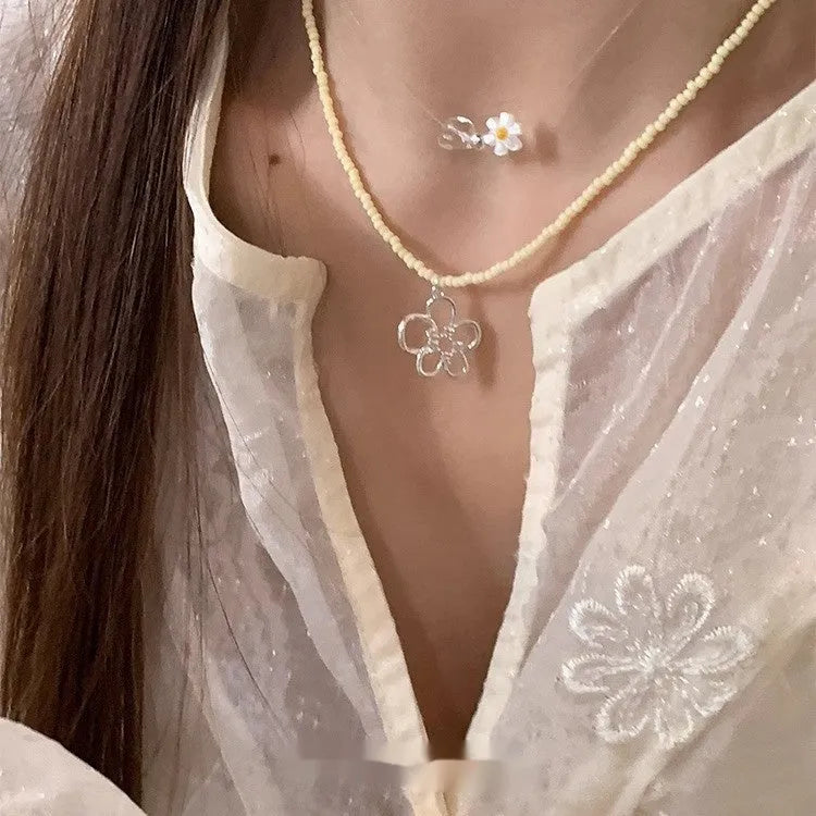 Women's Korean style copper necklace with colourful beaded hollow flower pendant