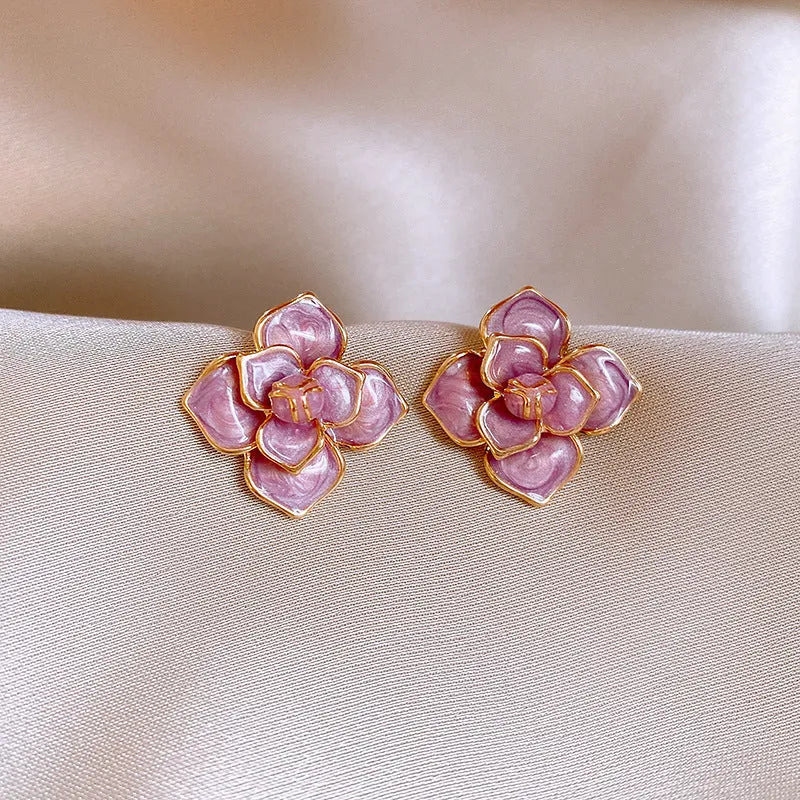Golden-purple oil-spot glaze flower stud earrings with gold-plated silver needle detail on copper.