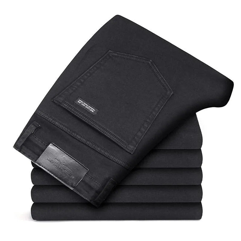Men's slim straight black jeans made of cotton denim, flat lay