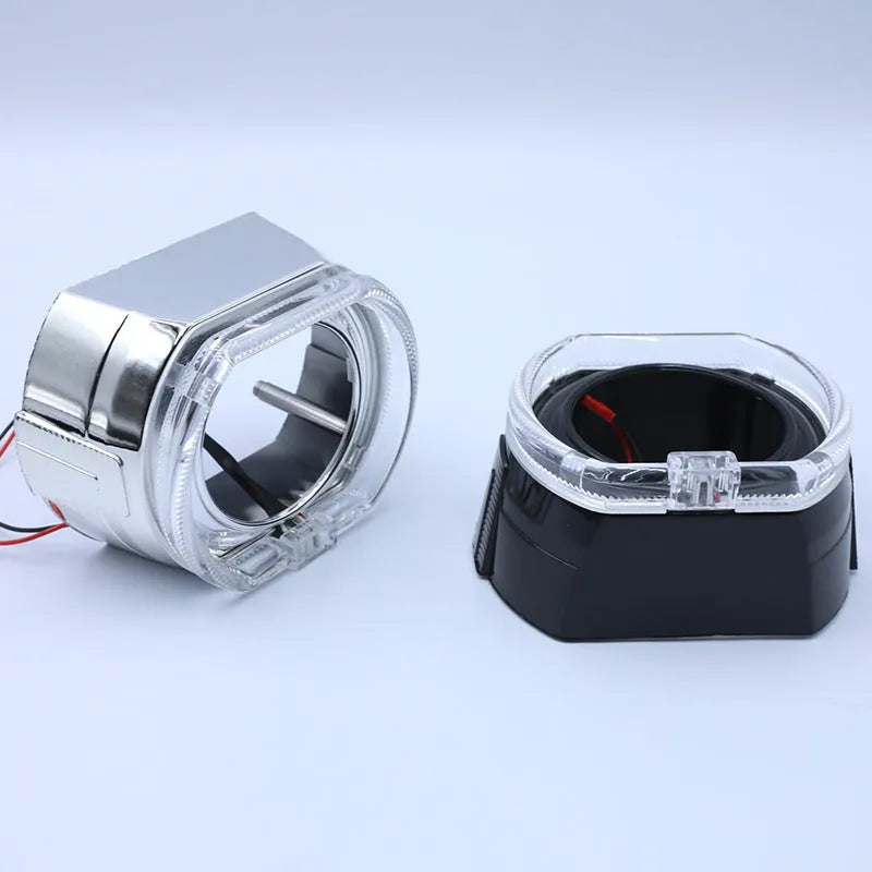 Black and silver vehicle angel eye mask light covers showing dual lens design and halo light effect.