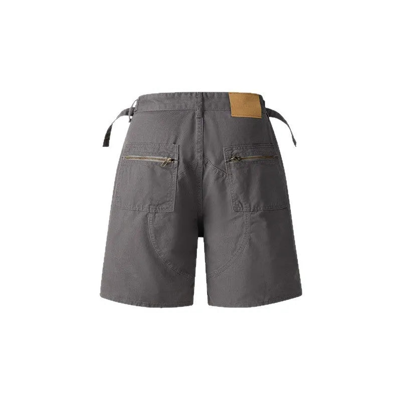 Grey loose-fit retro washed cotton shorts with elasticated waistband on a hanger.