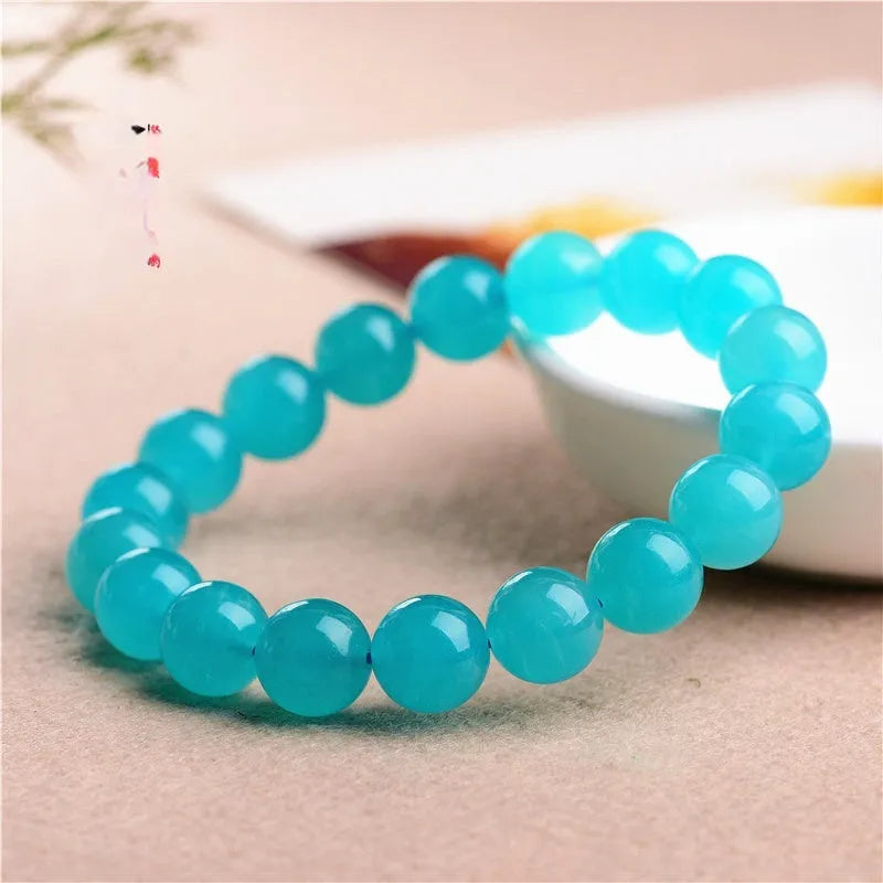 Natural Amazonite scattered beads in polished Grade 7A quality showing blue-green colouration
