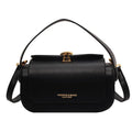 Women's personalised shoulder messenger bag in PU leather showing letter detailing and casual stitching
