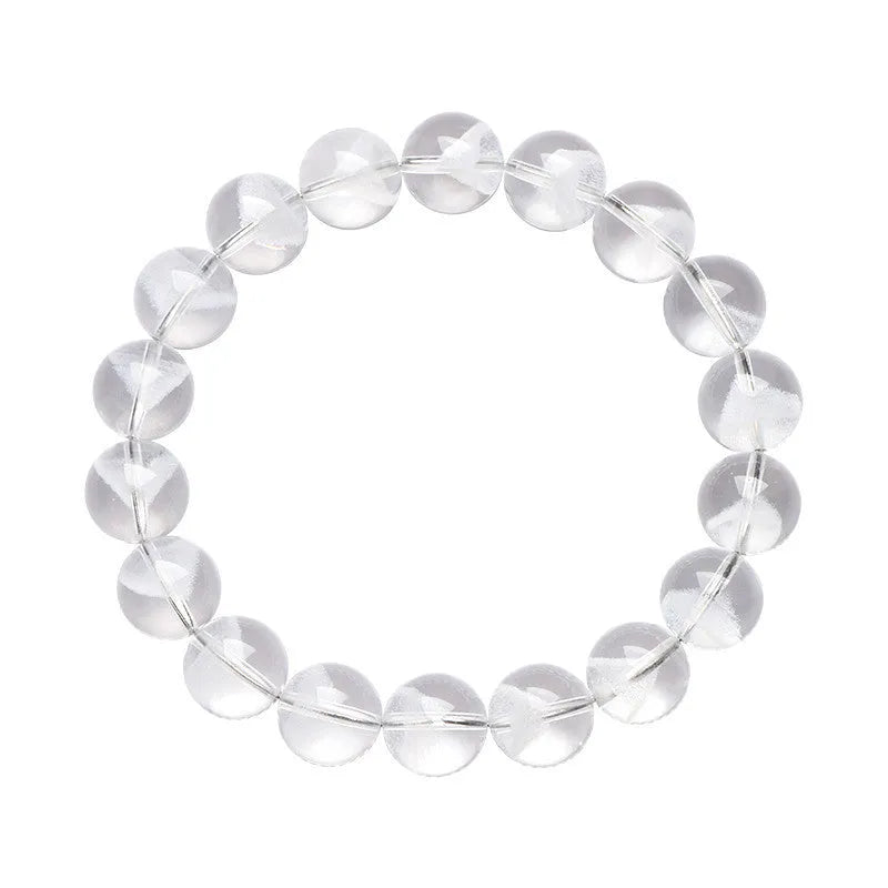 Women's white crystal bracelet with natural ghost pyramid shapes and Ruyi design elements