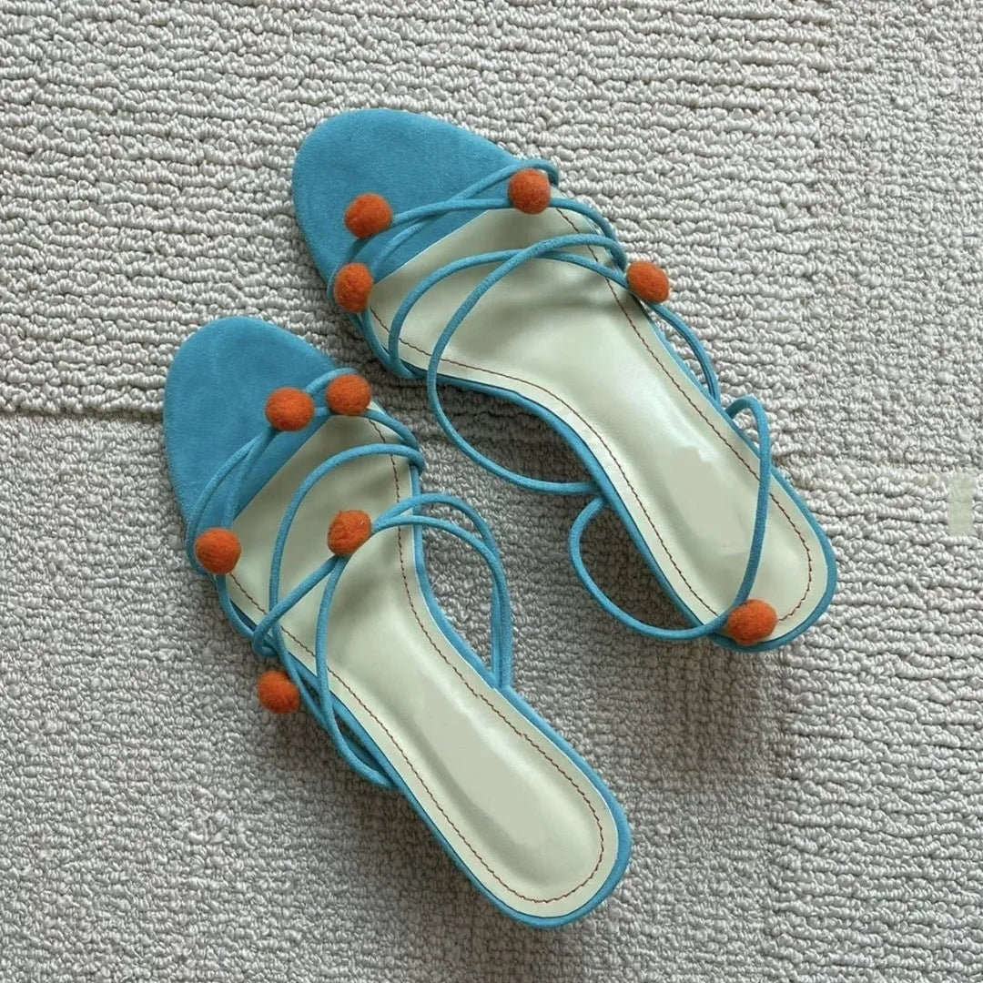 Cyan women's leather high-heel sandals with lace-up straps and ball decoration