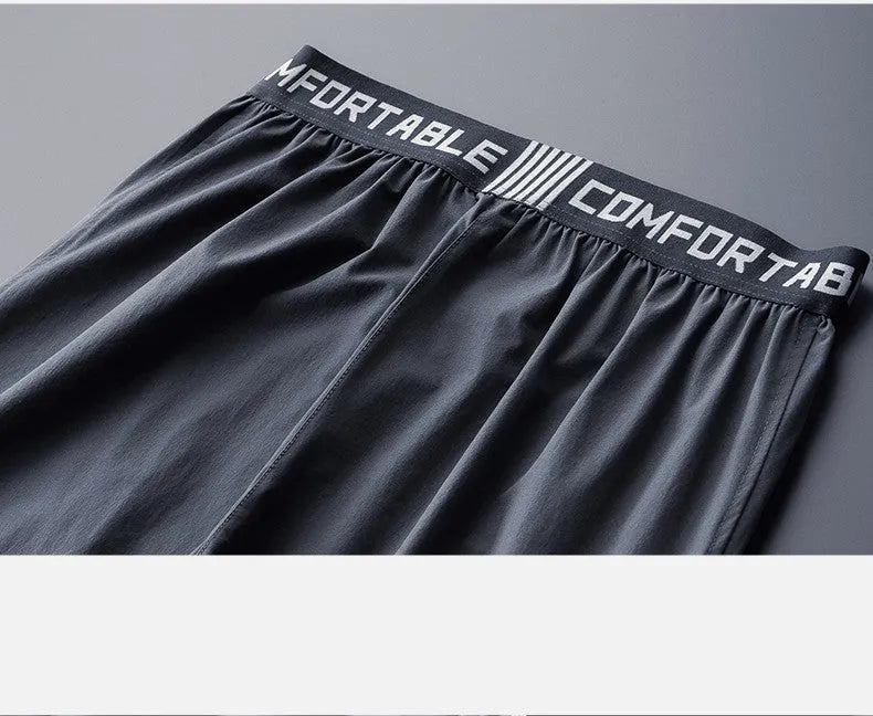 Quick-drying running pants for men in loose fit, multi colour options